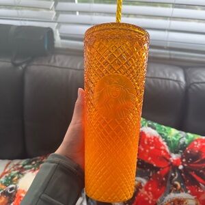 Orange starbucks cup